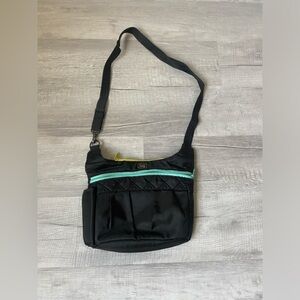 Lug brand Black Crossbody Bag with Aqua/80’s color Accents
